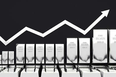 Black-and-white image of rows of gold bars below white line arrow